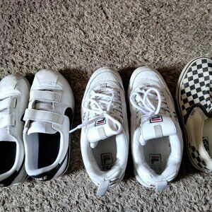 Shoes size 3 n the pink n white Nikes are a 4
